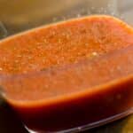 closeup of a glass bowl filled with Citrus pork marinade