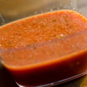 closeup of a glass bowl filled with Citrus pork marinade