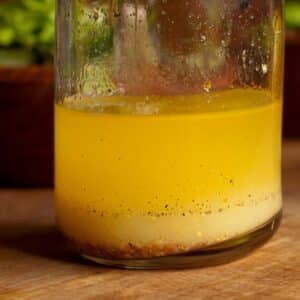 closeup of a glass carafe filled with Classic Lemon Vinaigrette