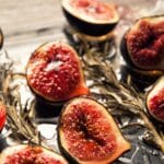 Honey-rosemary roasted figs served on a glass tray