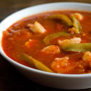 closeup of a bowl full of Shrimp gumbo in a white bowl