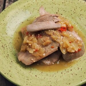 green bowl filled with Slow Cooked Beef Tongue